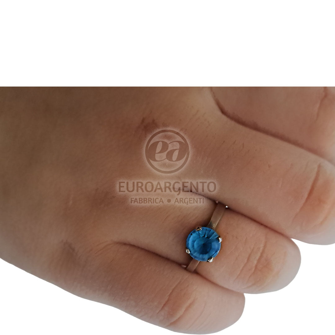 Anello con pietra celeste