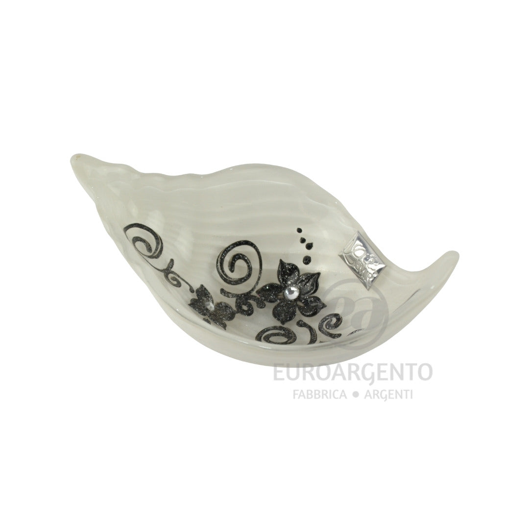 Conchiglia svuota tasche